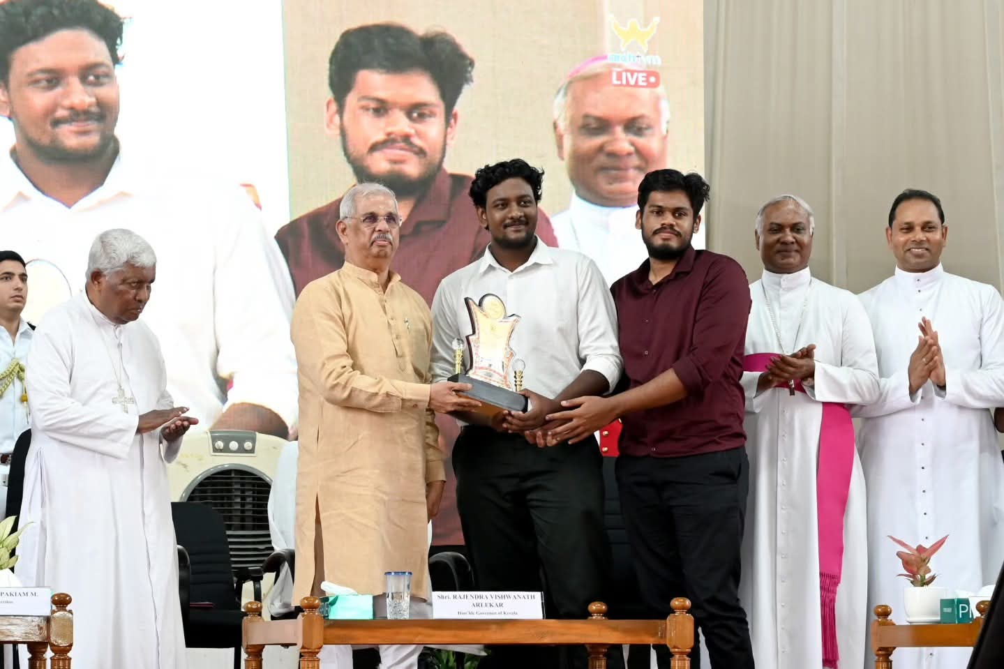 a group sitting around a table