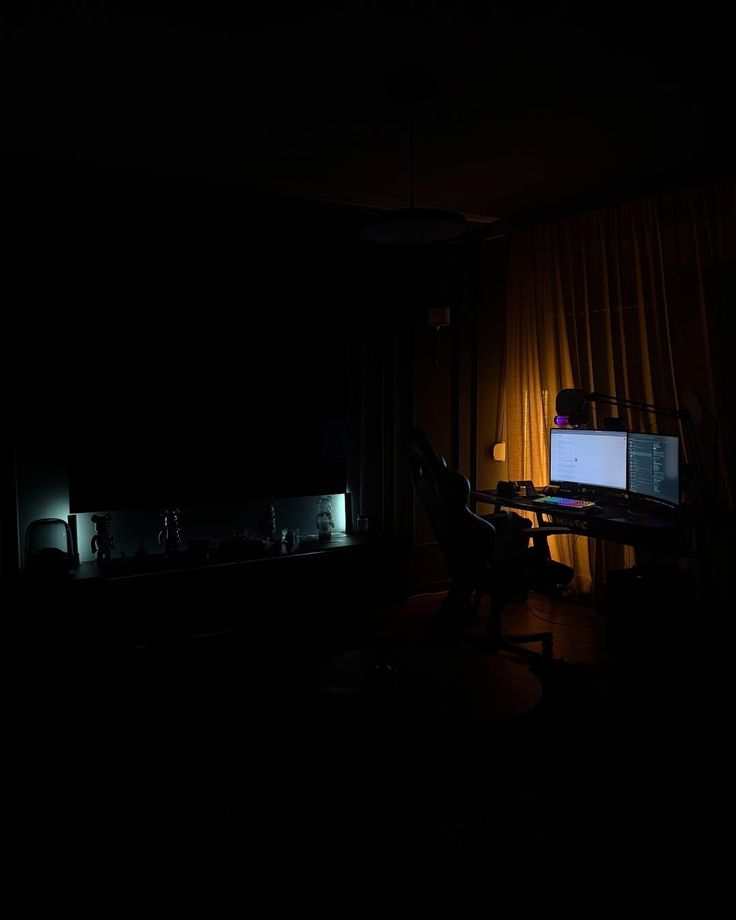 A black and white portrait image of Morgan looking into the camera.